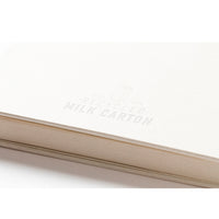 Quaderno a doppio anello con copertina di cartone del latte riciclato
