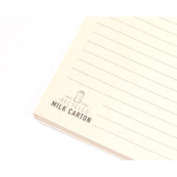 Quaderno a doppio anello con copertina di cartone del latte riciclato