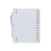 Set quaderno e penna con estratti di pietra