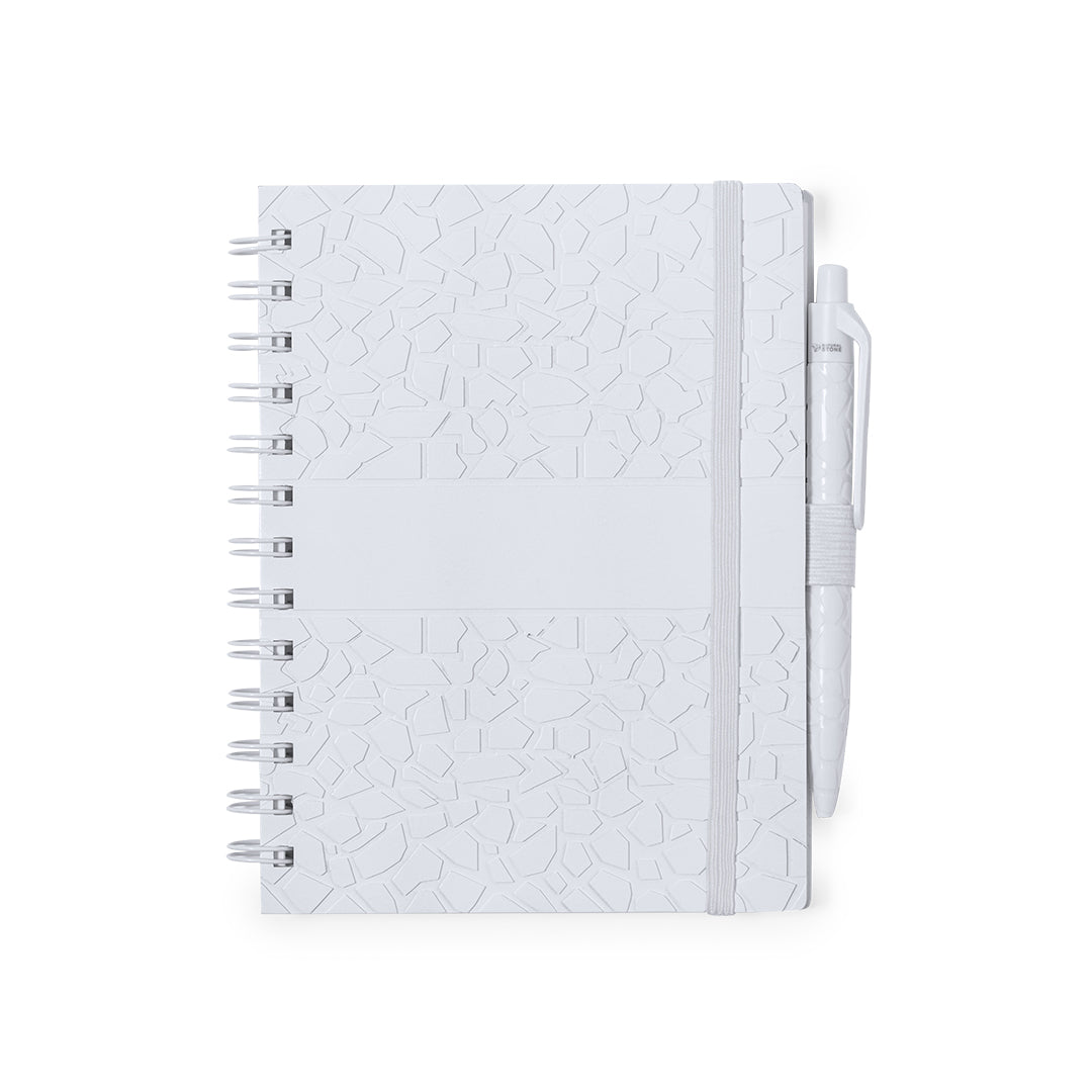 Set quaderno e penna con estratti di pietra