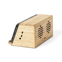 Cassa con ricarica wireless e supporto smartphone