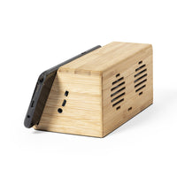 Cassa con ricarica wireless e supporto smartphone